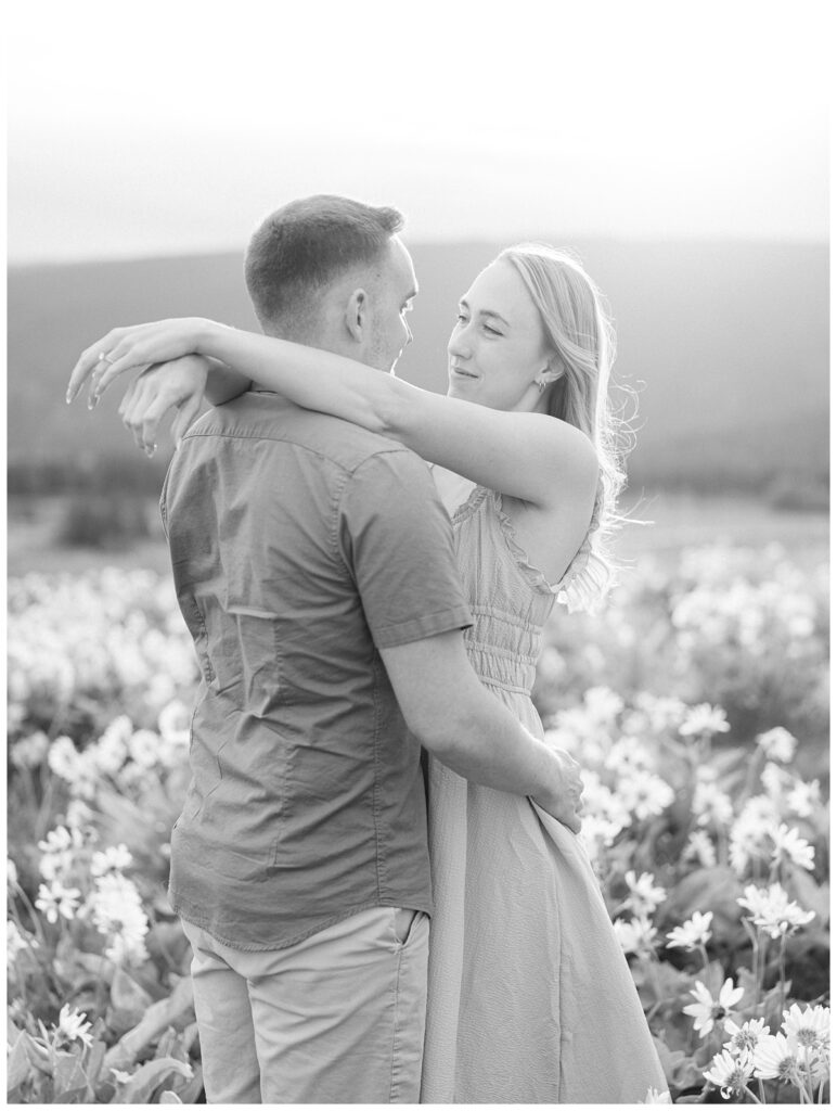 A couple during their Kamloops balsamroot engagement session.