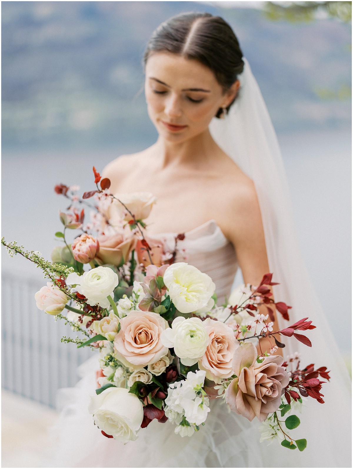 A bride poses for photos for a European inspired wedding editorial at Chateau Okanagan.